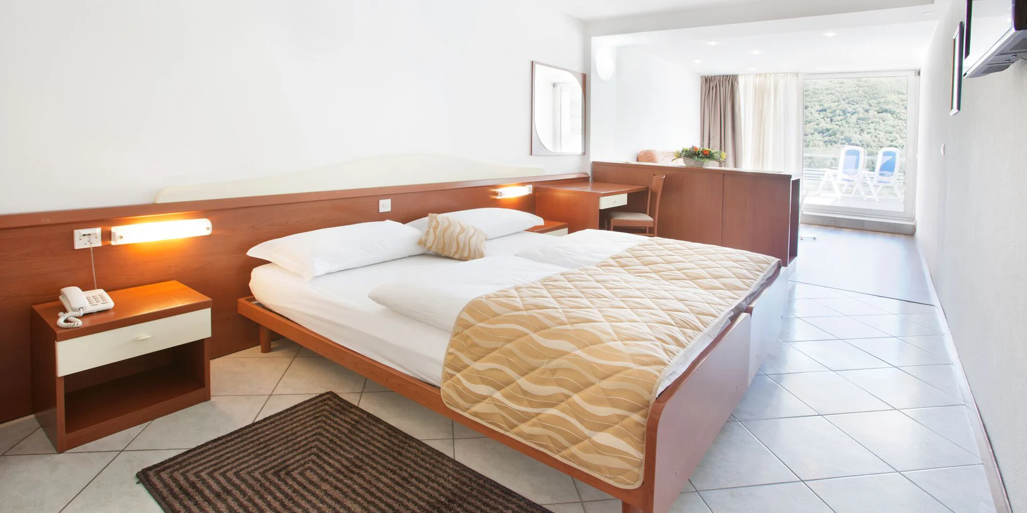 Dovolená v Rabacu na Istrii: 4* hotel u pláže, polopenze či all inclusive, bazénový komplex