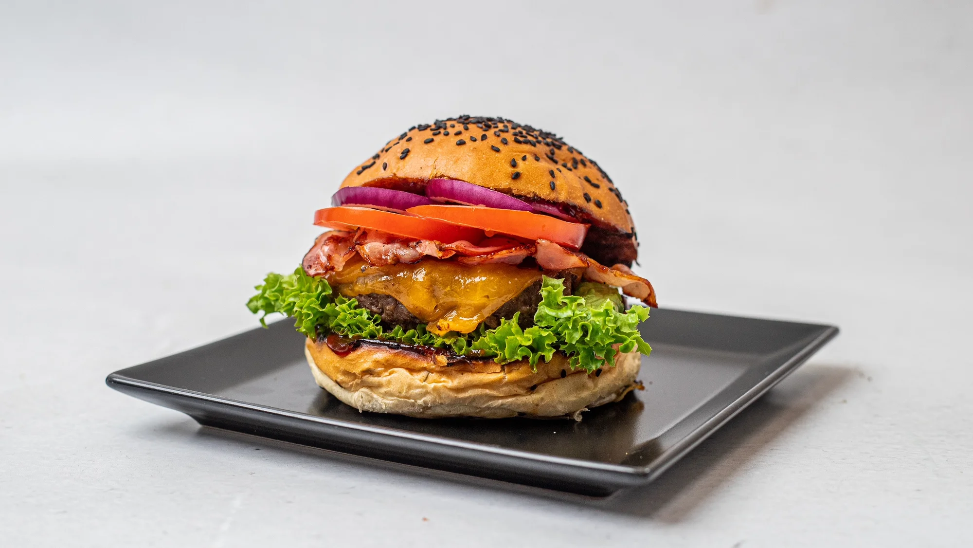 Vymazlený burger nebo pizza dle výběru a nápoj k zaplnění jednoho i dvou vyhládlých a žíznivých žaludků