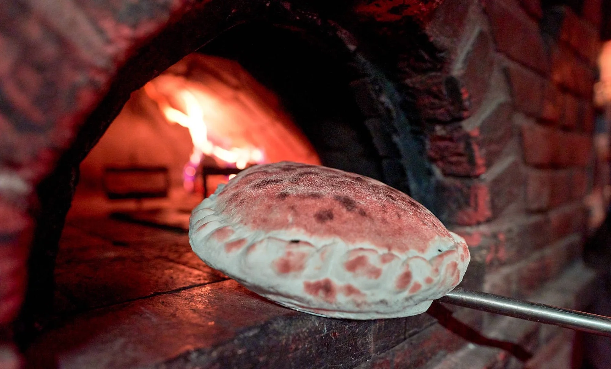 1–2 pizzy o průměru 33 cm či Calzone dle výběru a 10% sleva na nápoje