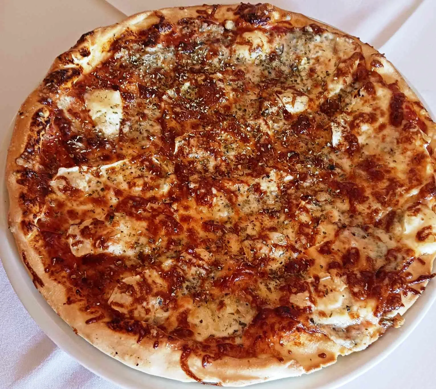 Hodina bowlingu až pro 8 osob a pizza podle výběru nebo 300 g kuřecích řízečků