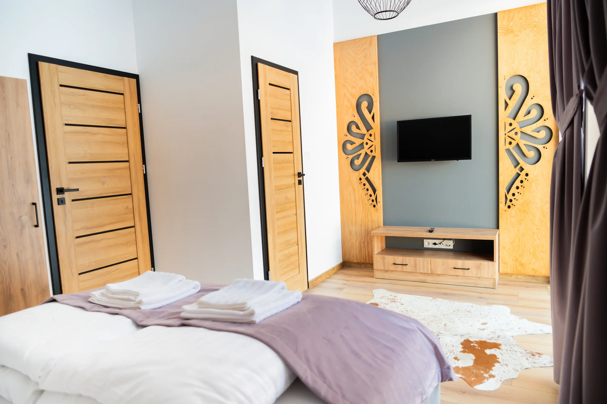 Moderní apartmány ve stylu horské chaty na břehu Dunajce přímo pod Třemi Korunami s výhledem, krbem i terasou