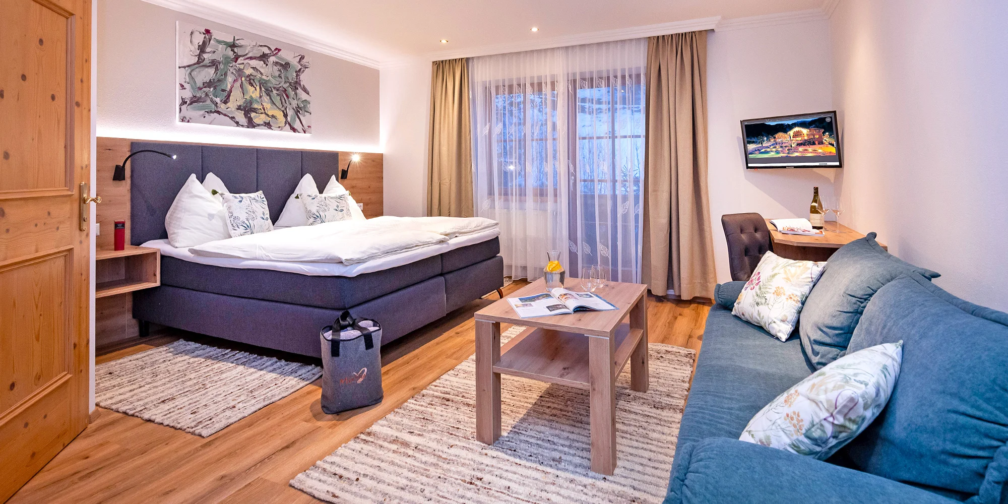 Boutique hotel v Zell am See: wellness s přírodním jezírkem, polopenze i karta výhod