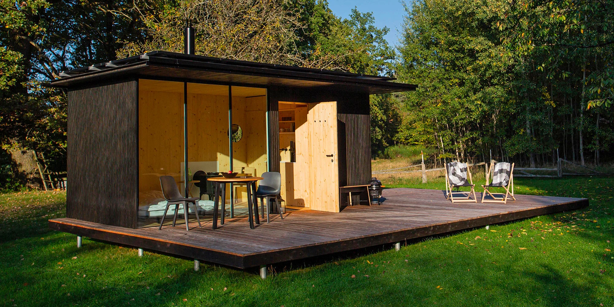 Minimalistický tiny house se soukromou saunou