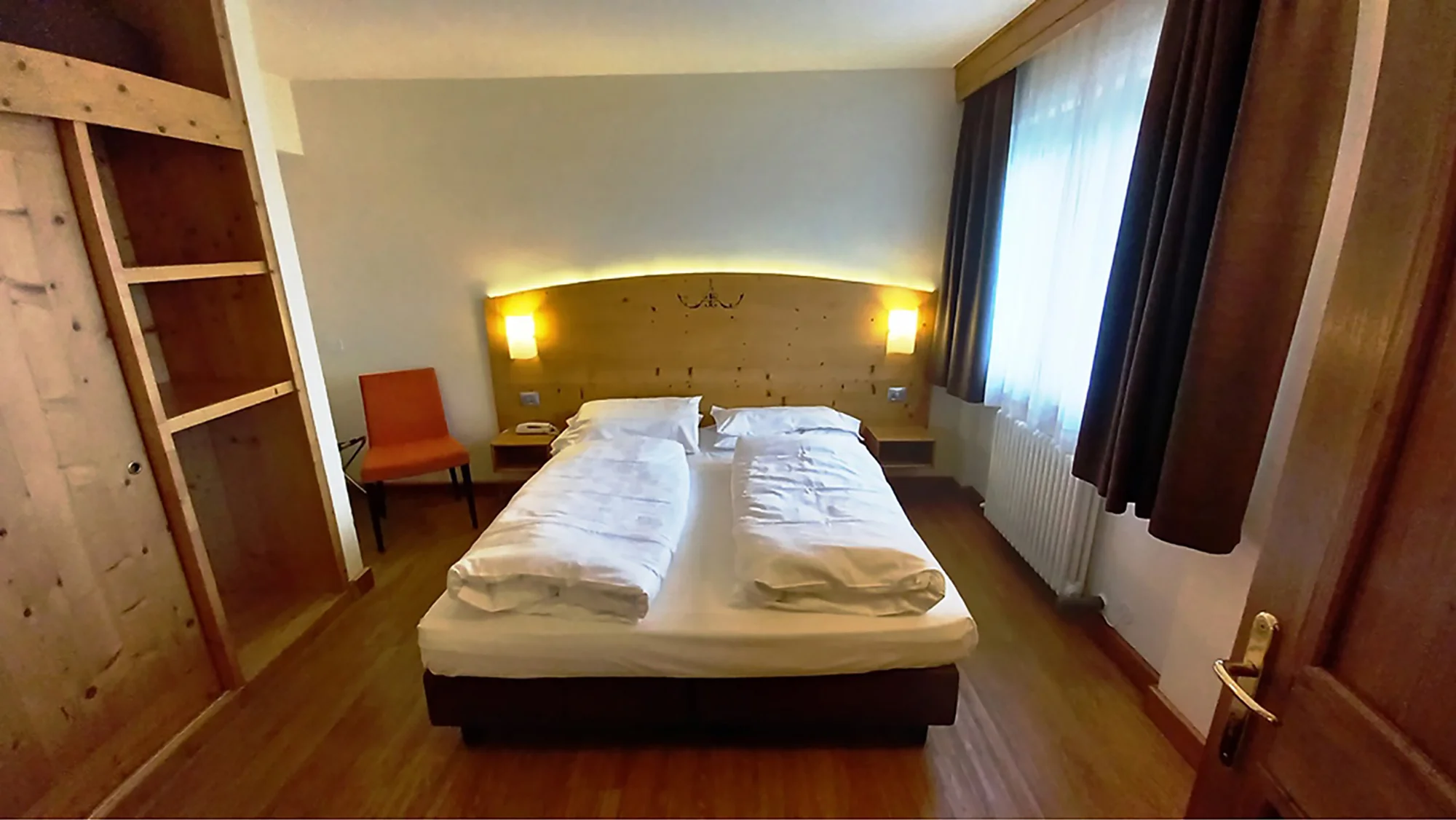 Trentinské Alpy: 3* hotel s polopenzí, neomezeným wellness a kartou výhod
