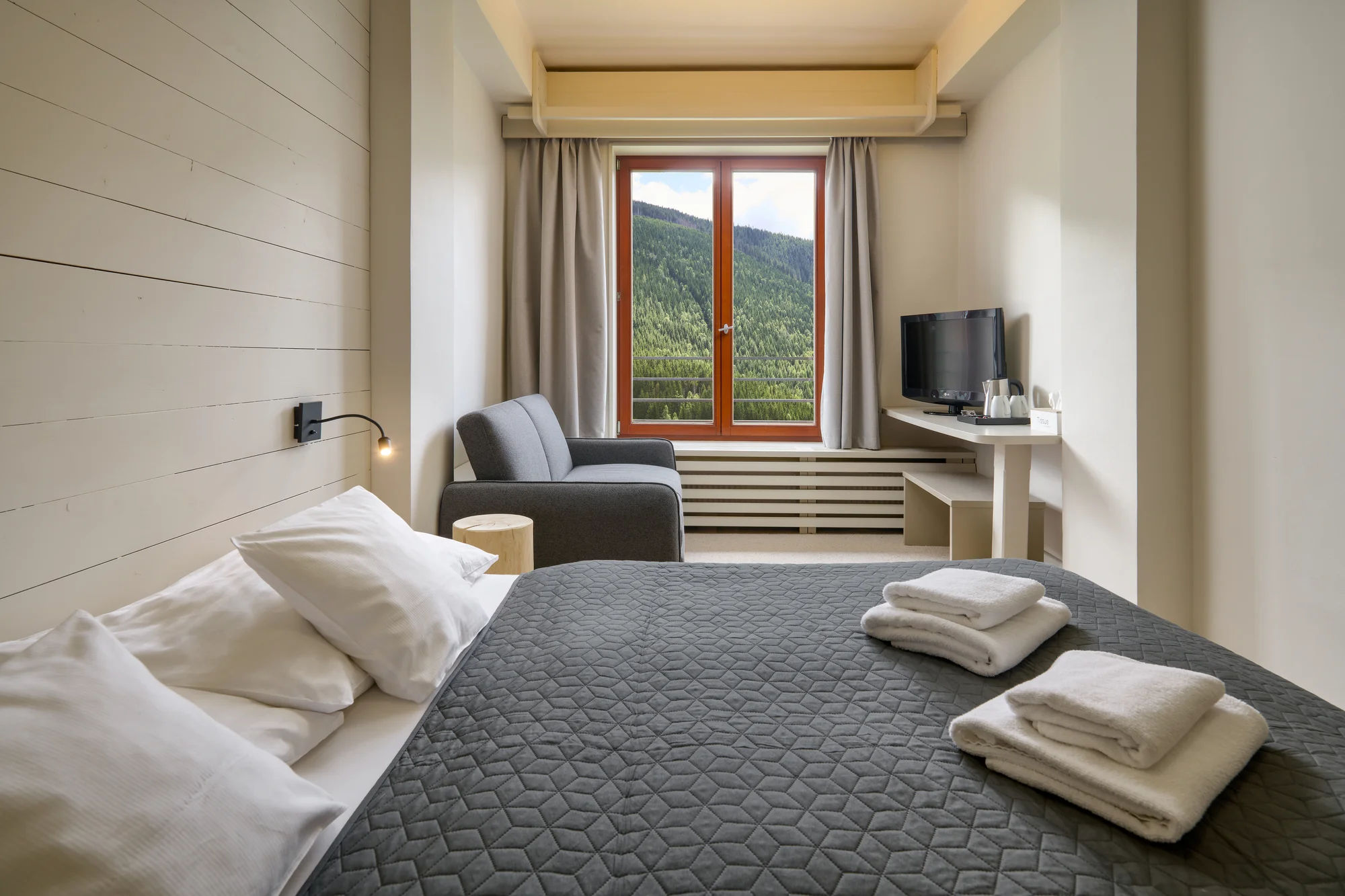 Wellness ve Špindlu se snídaní či polopenzí, neomezený vstup do bazénu a saunového světa