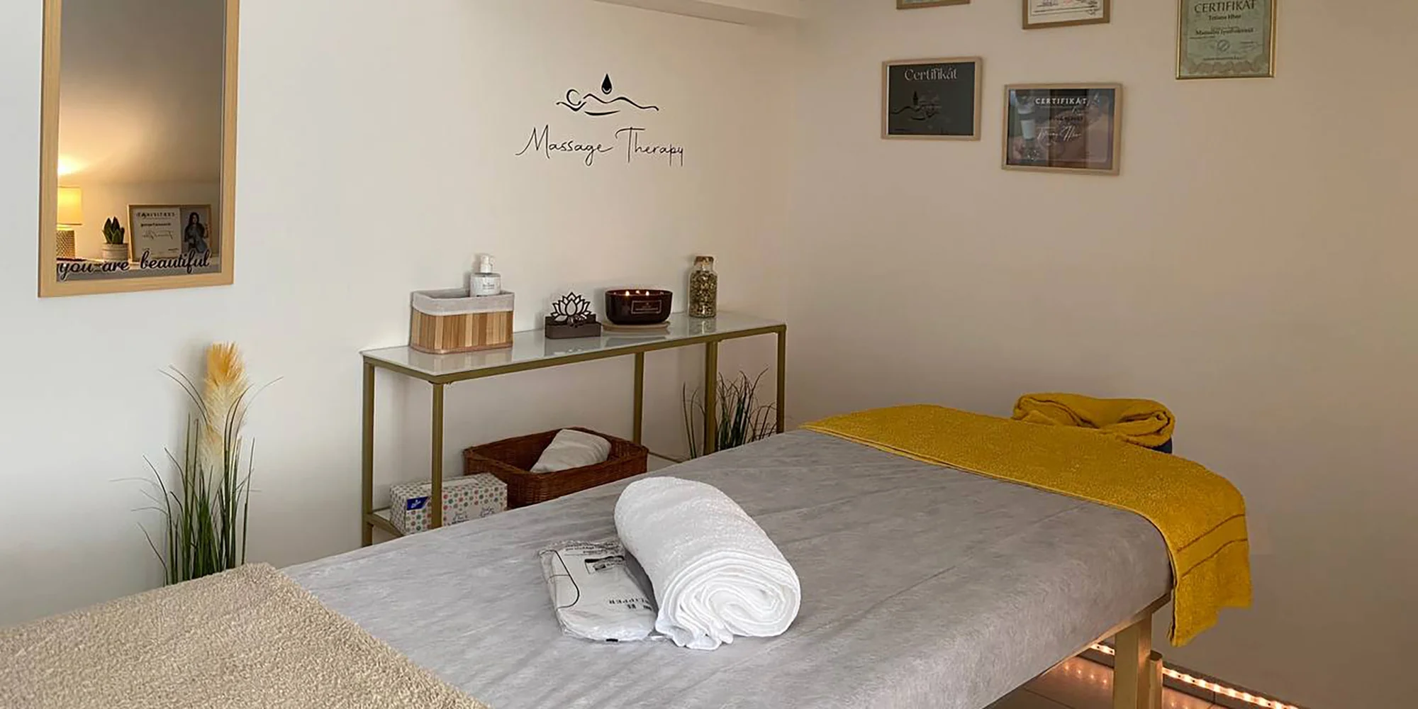 Masáže dle výběru: masáž zad, klasická nebo relax s lávovými kameny