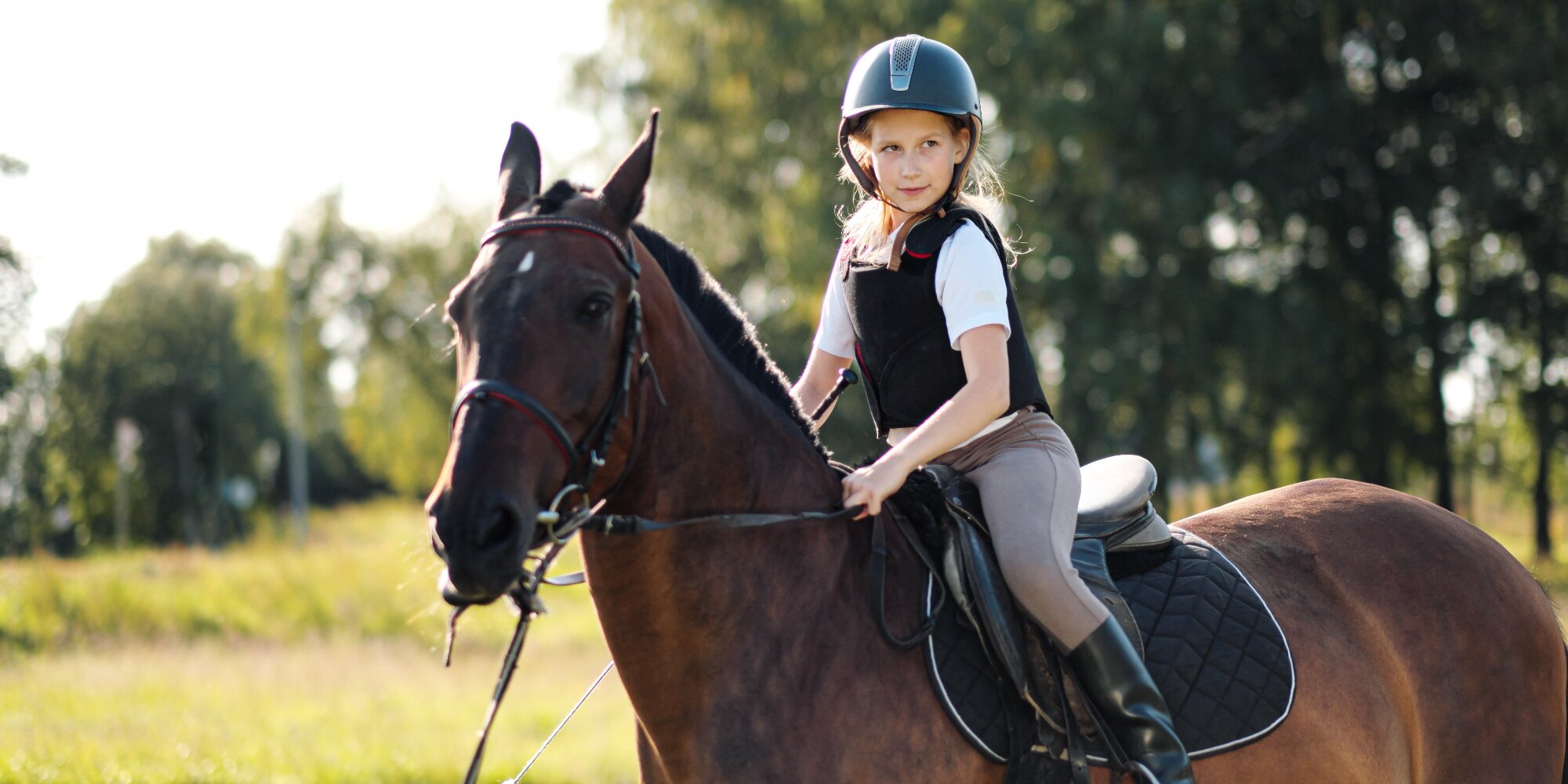 She s riding a horse