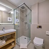 Dvoulůžkový pokoj s přistýlkami (26 m²)