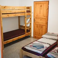 Čtyřlůžkový pokoj s palandou