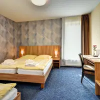 Třílůžkový pokoj – standard (25 m²)