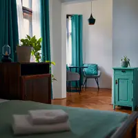 Dvoulůžkový s manželskou postelí (menší)