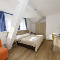 Dvoulůžkový pokoj Komfort s přistýlkou