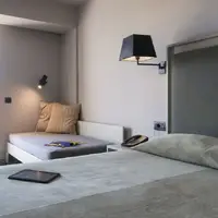 Dvoulůžkový pokoj s 1 přistýlkou - výhled do zahrady (21 m²)