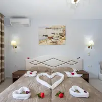 Dvoulůžkový pokoj superior se 2 přistýlkami (17–20 m²)