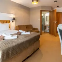 Dvoulůžkový pokoj se 2 přistýlkami (23 m²)