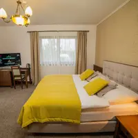 Dvoulůžkový pokoj LUX se dvěma přistýlkami (28–36 m²)