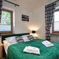Apartmán Deluxe s krbem (30 m²)