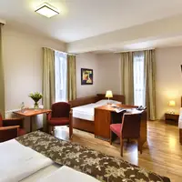 Čtyřlůžkové pokoje bez přistýlky 208, 307 (26 m²)