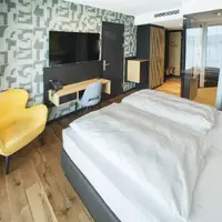 Štvorlôžková izba Business s balkónom (44 m²)