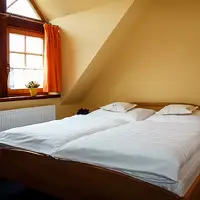 Dvoulůžkový pokoj s manželskou postelí