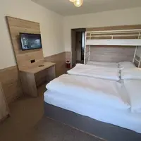 Čtyřlůžkový pokoj Deluxe 114, 115, 116, 117, 118, 119, 201 (15 m²)