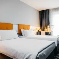 Dvoulůžkový pokoj s oddělenými postelemi (20–22 m²)