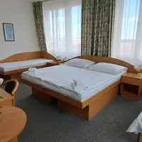 Čtyřlůžkový pokoj (26 m²)