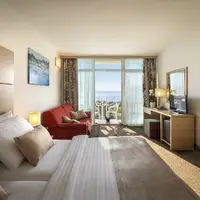 Junior suite s balkonem (26–30 m²)
