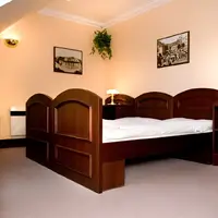 Dvojlôžková izba s manželskou posteľou