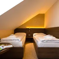 Dvojlôžková izba Classic v podkroví s oddelenými lôžkami (2+0) (20–25 m²)