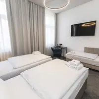 Trojlôžková izba v zníženom prízemí (22 m²)