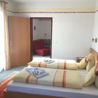 Čtyřlůžkový pokoj s balkónem (26 m²)