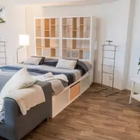 Dvoulůžkový apartmán Deluxe s manželskou postelí a přistýlkou
