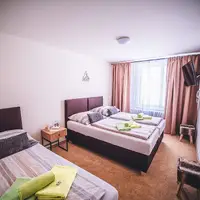 Třílůžkový pokoj část B** (18–22 m²)