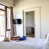 Dvoulůžkový pokoj s výhledem do zahrady (25 m²)