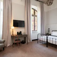 Rodinný pokoj (s manželskou postelí a rozkládací pohovkou) (27–32 m²)