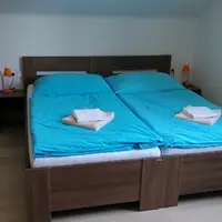 Třílůžkový pokoj s kuchyňkou
