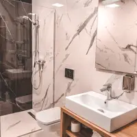 Trojlôžkový apartmán s balkónom (32 m²)