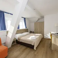 Dvoulůžkový pokoj Komfort s přistýlkou
