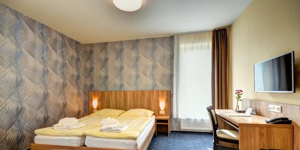 Třílůžkový pokoj – standard (25 m²)