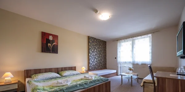 Trojlůžkový pokoj