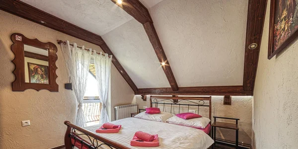 Štvorlôžková izba Deluxe s balkónom