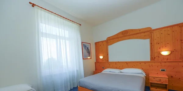 Třílůžkový pokoj