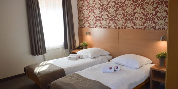 Dvoulůžkový pokoj s přistýlkou (20 m²)