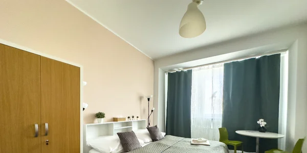 Dvoulůžkový pokoj Comfort s manželskou postelí a TV