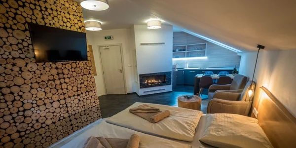 Deluxe štúdio s krbom (32 m²)