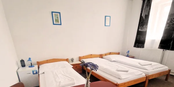 Štvorlôžková izba s vlastnou kúpeľňou