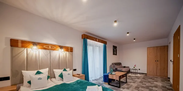 Čtyřlůžkový pokoj s terasou (28 m²)