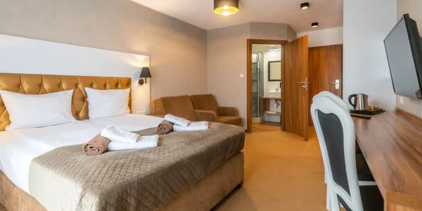Dvoulůžkový pokoj se 2 přistýlkami (23 m²)