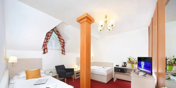 Pokoj Deluxe č. 112 s oddělenými lůžky